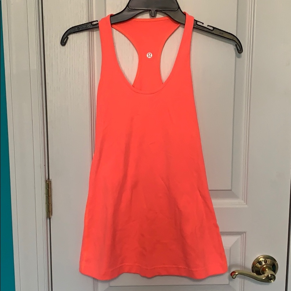 Never worn coral lululemon workout top size 2